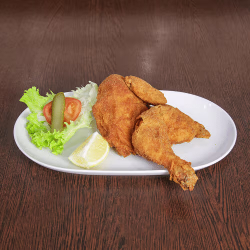 Halbes Backhuhn mit Beilage nach Wahl
