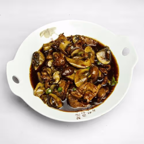 Schweinefleisch mit Champignons