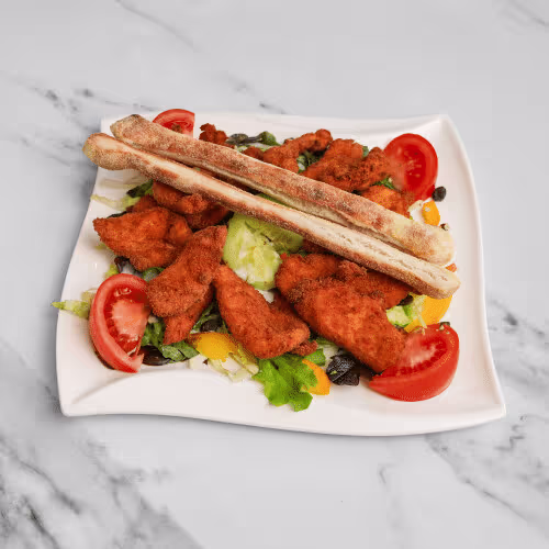 Salat mit gebackenen Hühnerstreifen