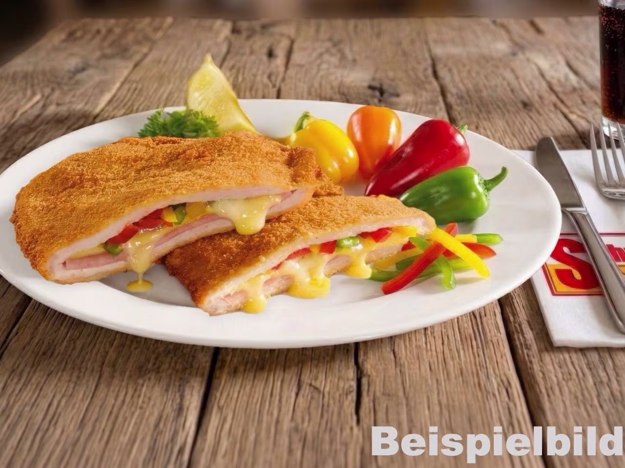Puszta Cordon Blue (Schinken, Käse, Paprika u. Zwiebel) + 1 Beilage