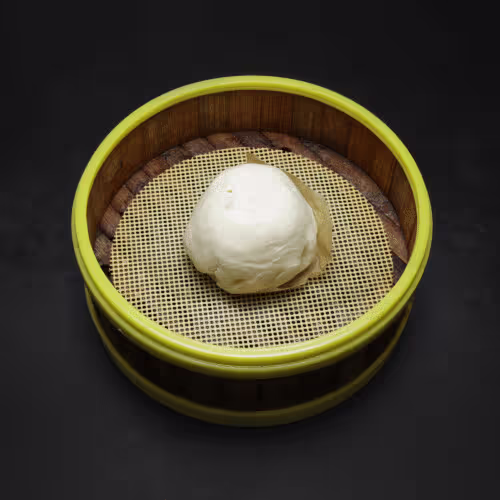 Gedämpfte Teigknödel mit Vanillefüllung