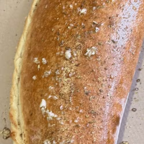 Pizzastangerl mit Schinken und Mais