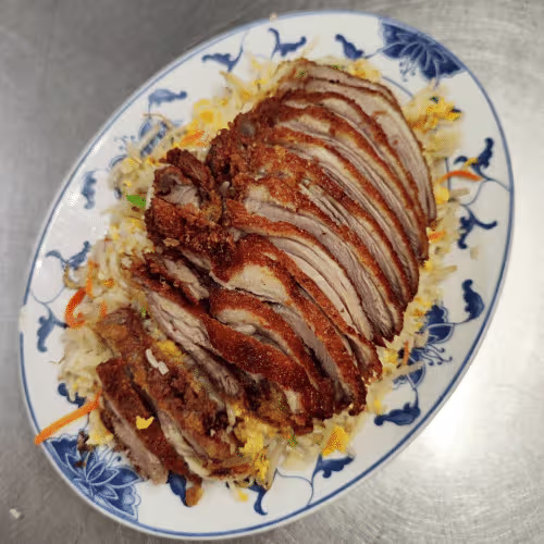 Ente auf gebratenem Reis