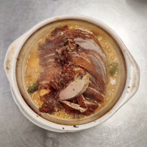 Ente mit Kokosmilch und roter Thai Curry-Paste