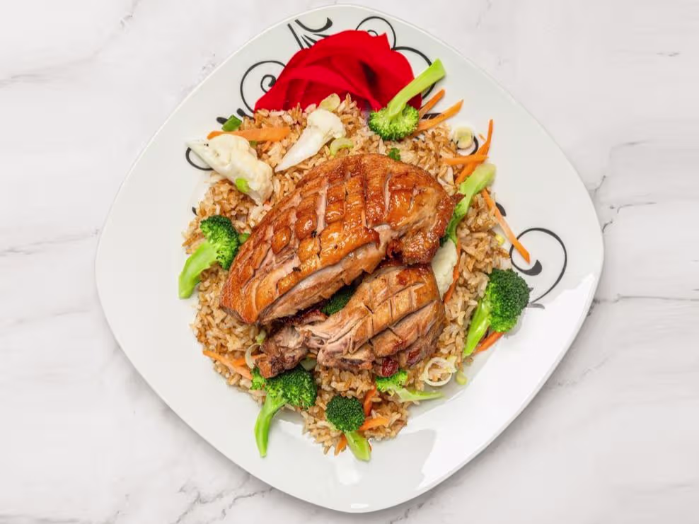 Knusprige Ente mit gebratenem Reis