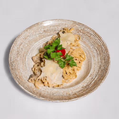 Tagliatelle con Pancetta e Porcini