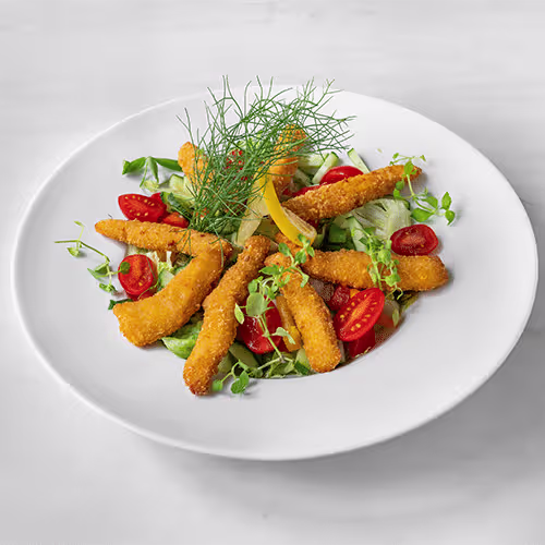 Backhendlstreifen auf gemischtem Salat