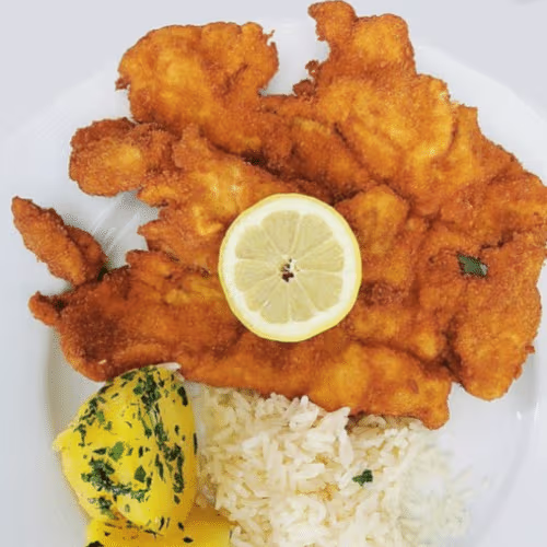 Riesenschnitzel Wiener Art von Huhn, Pute, Sur oder Schwein