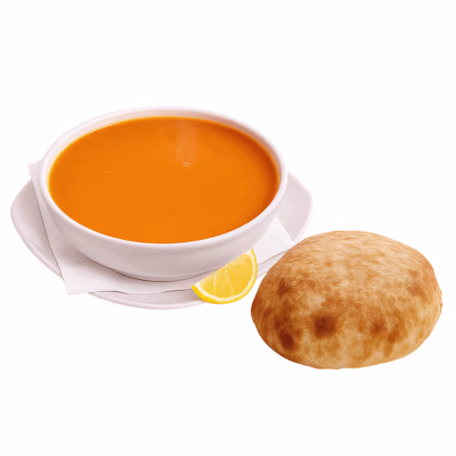 Linsensuppe mit Brot und Zitrone