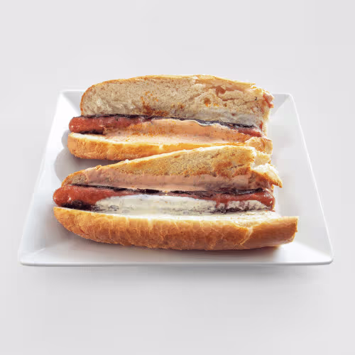 Käsekrainer Bosna mit Currysauce und Zwiebeln