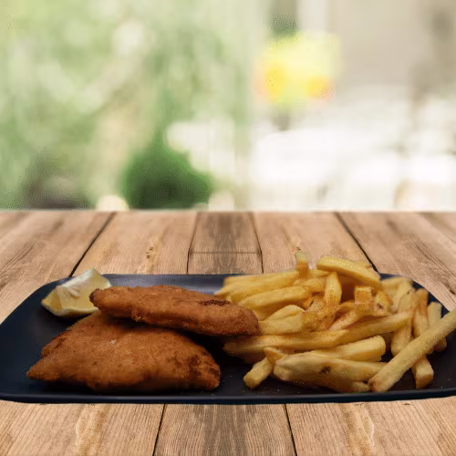 Schnitzel vom Huhn mit Pommes Frites