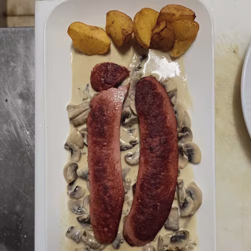 Debreziner mit champignon Soße