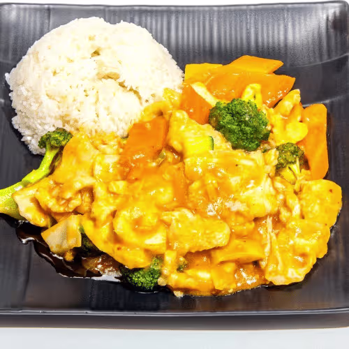 Huhn mit Wokgemüse in Currysauce , dazu Reis