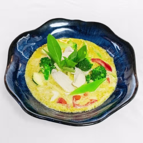 Grünes Curry mit Gemüse und Zutat nach Wahl (scharf)