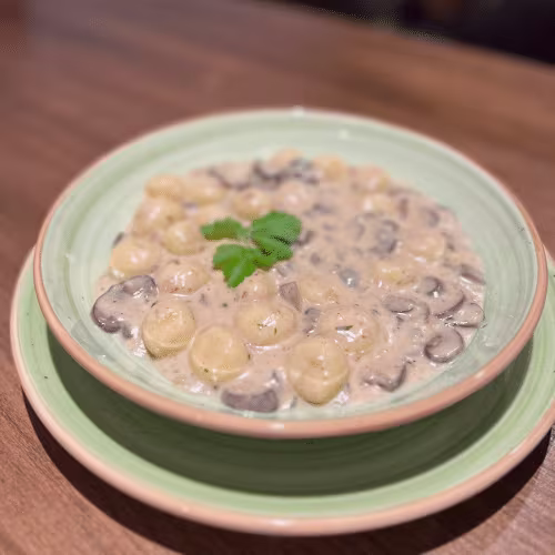Knödelbällchen in Champignon Sauce
