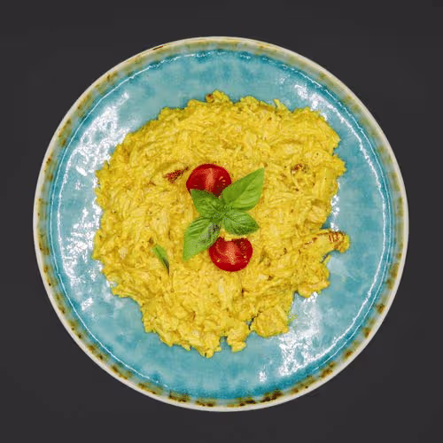 Curryhuhn mit Reis und Ananas