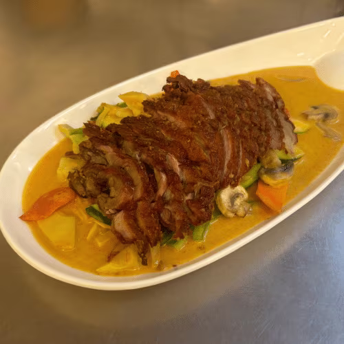 Ente mit rotem Curry (scharf)